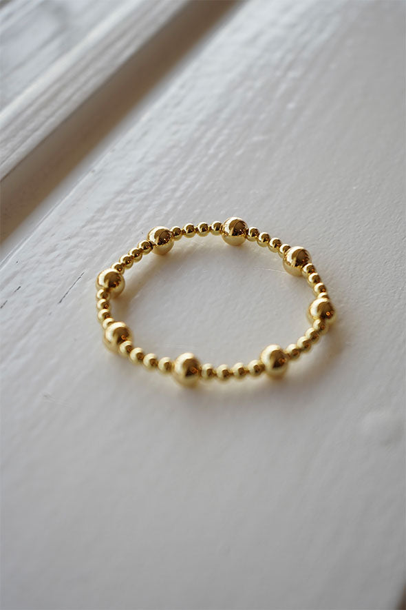 Gold beaded stretch bracelet