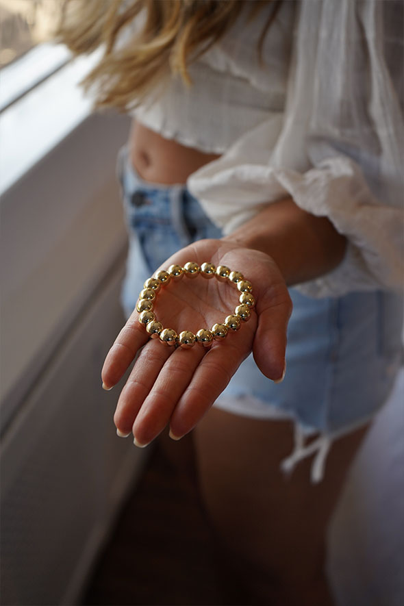 Large gold beaded shiny Stretch bracelet